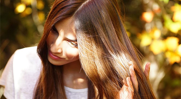 Try a chocolate brown hair dye to create an on-trend look with warmth!