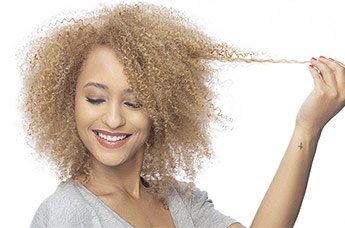Curly blonde hair, healthy hair