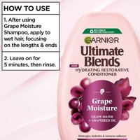 Garnier Grape Moisture conditioner bottle with application and rinsing instructions